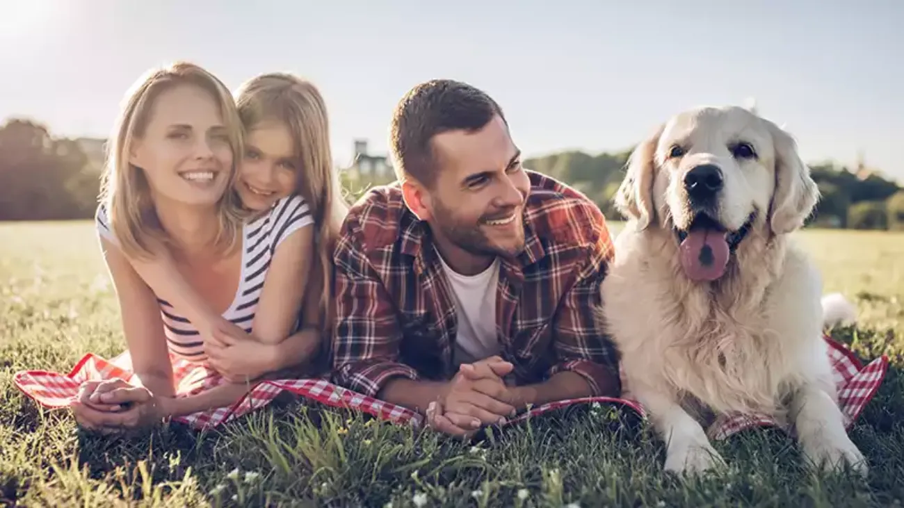 A family outdoors, enjoying the spring weather.
