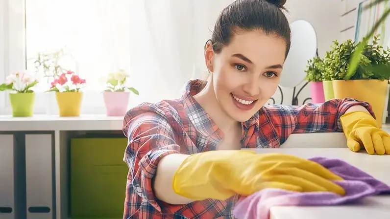 Woman cleaning counter
