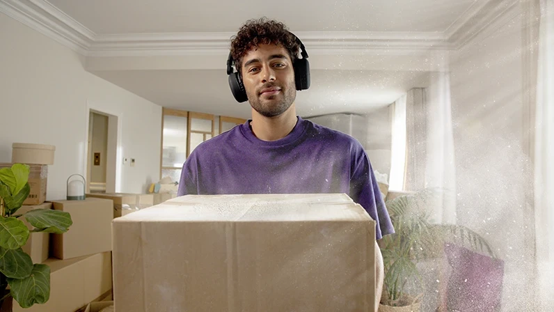 A man riding an exercise bike in his garage.